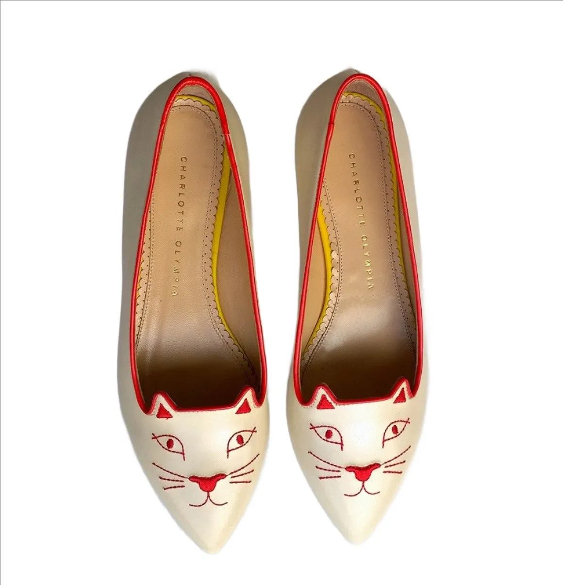 Charlotte Olympia Mid Century Kitty Cream flats with yellow heel and red accent