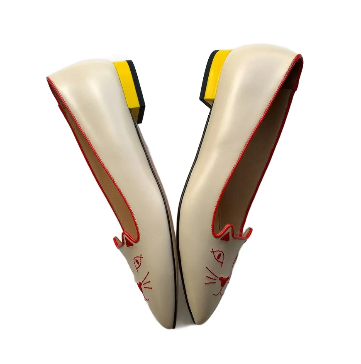 Charlotte Olympia Mid Century Kitty Cream flats with yellow heel and red accent